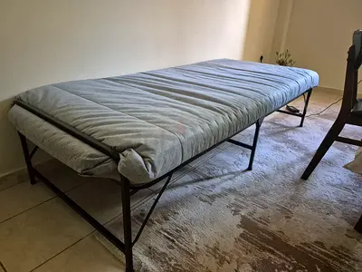 Foldable Bed and mattress new condition