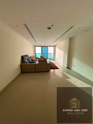 Fully Furnished 2-BR Apartment for Rent in Corniche Tower Ajman – Free AC & Parking