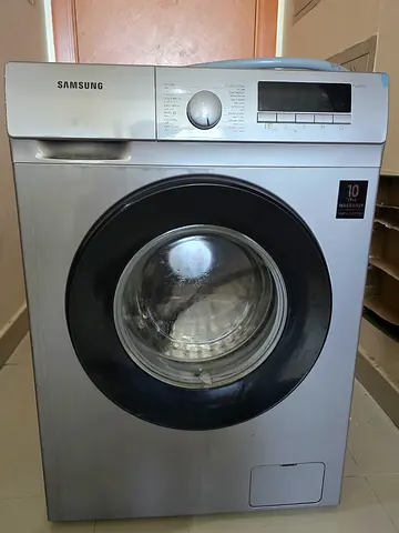 Samsung front-load washing machine - 7kg, Silver (used) Needs Repair (Drum Issue)