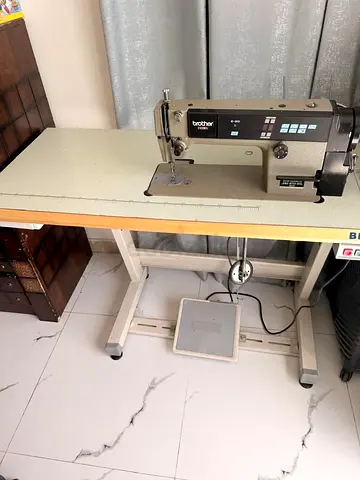 Industrial Brother B-8550 Sewing Machine on Work Table - Good Working Condition