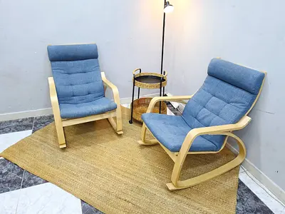 Pair of Light Wood Ikea Lounge Chairs with Blue Cushion