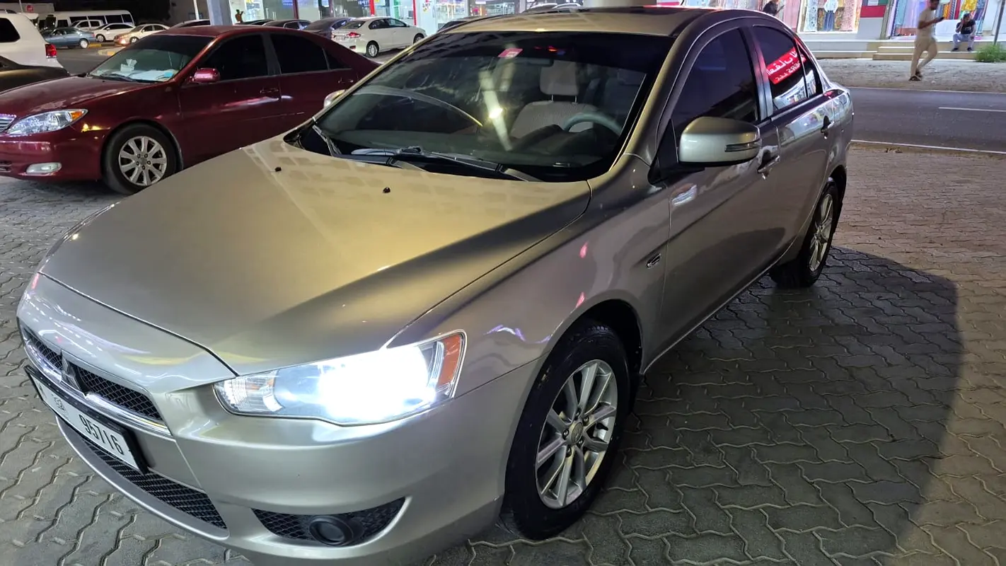 Mitsubishi Lancer 2016 — photo 1 of 14