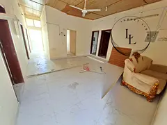 Spacious 7 bedroom hall plus studio &amp; 3 kitchens / al sabkha area