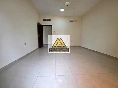 A spacious 2-bedroom apartment available for annual rent in a prime location in Al Nuaimiya 1