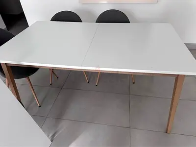 White Extendable Dining Table with Wooden Legs - Modern Minimalist