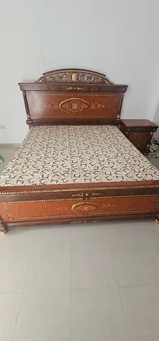 Solid wood king-size bed with Mattress and carved headboard - good condition