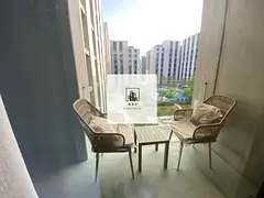 Modern spacious studio with pool view balcony