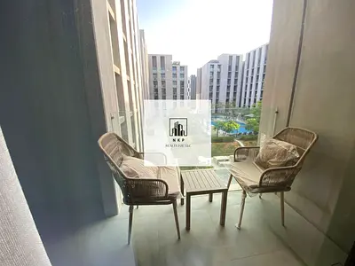 Modern spacious studio with pool view balcony