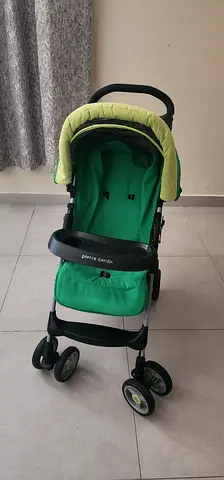 Lightweight green Pierre Cardin baby stroller - good condition discounted