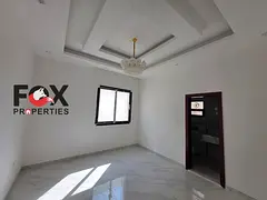 Brand new villa for rent in Al Zahia, Ajman. 5 master bedrooms, maid's room, and yard. Available
