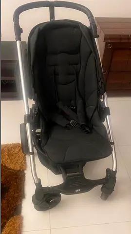 Lightly used black stroller - single seat, compact frame