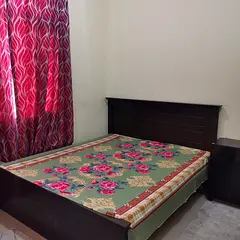 furnished room for rent with attached washroom at mbz zone1 near mazyed mall for family or couple