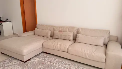 Light beige L-shaped 3-seater sofa with chaise lounge