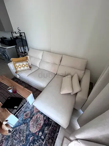 Light beige L-shaped corner sofa - good condition