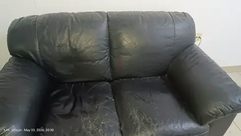 Used black leather 2-seater sofa