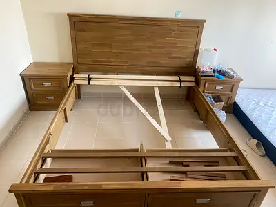 Solid wood queen bed frame with storage and matching nightstands, usend for 3 months