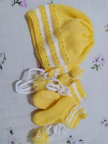 Hand-knitted yellow baby hat and mittens set, newborn size