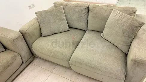 Light grey 2-seater fabric sofa in good condition , Very comfortable