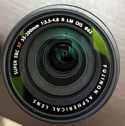 Fujinon XF 55-200mm f/3.5-4.8 R LM OIS telephoto zoom lens with IR filter.