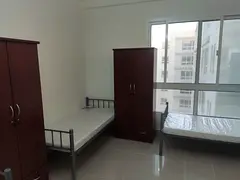Executive male bachelor bedspace available in al khail gate