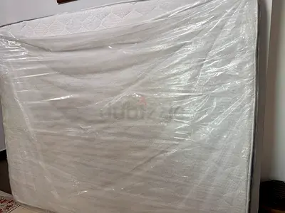 Comfortable Queen Size Mattress with White Quilted Top