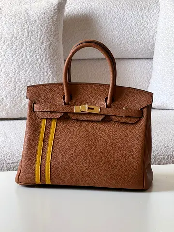 Hermes’s Brown leather handbag with yellow stripe - structured top-handle bag