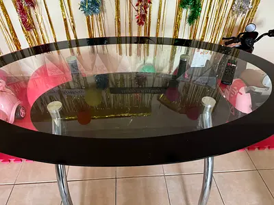 Oval Glass Top Dining/Center Table with Black Frame without chairs