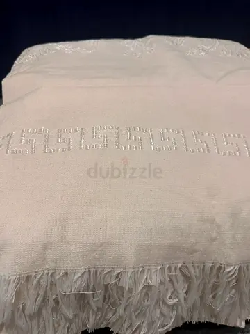 White fringed table cover with embroidered border - excelent condition