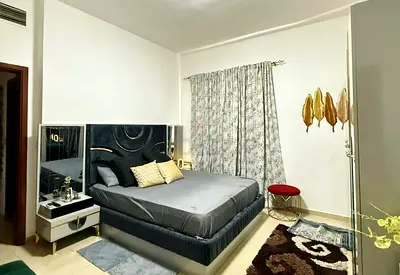 Modern Bed with Upholstered Headboard and Matching Side Table