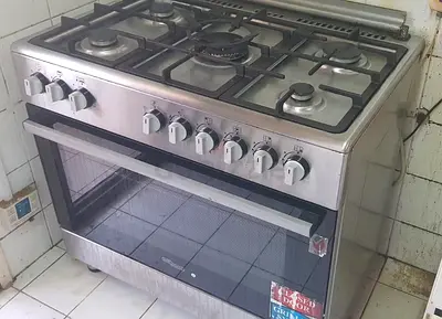 Used freestanding 5-burner gas stove with oven - stainless steel