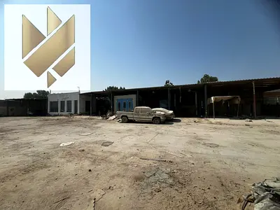 Car garages for rent in Industrial Area 5, on a main road corner plot with two entrances and fully equipped facilities.