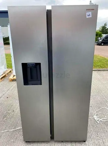 Samsung Side-by-Side Refrigerator with Water Dispenser and ice maker inside tank easy fill used