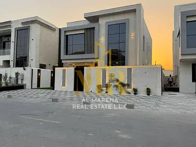 A villa with all registration, ownership, electricity, and water fees included, located on the main street, ready to move in, in one of Ajman's most p