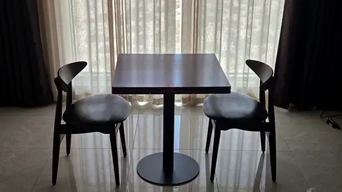 Compact square dining table with two wooden chairs - set of 3