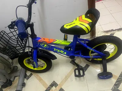 Childrens 12-inch Blue  Yellow Bike with Training Wheels and Basket - Good Condition