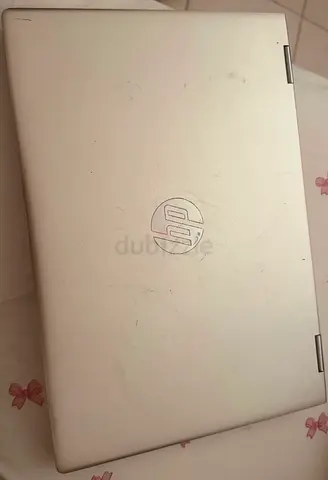 HP laptop - used silver HP Pavilion (needs checking) (price negotiable down to 350 aed)