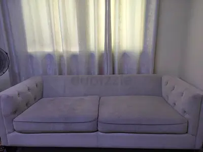 Light grey 2-seater tufted sofa - good condition