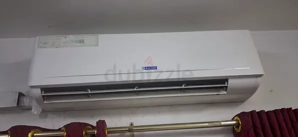 Used Wall-Mounted Split Air Conditioner - Good Working Condition