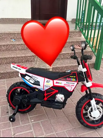 Kids Electric Ride-On Motorbike with Training Wheels - Good Condition