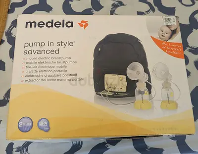 Breast pump set ( battery operated) medela