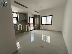 First-tenant studio for annual rent in Al Alia, Ajman. New building, prime location, easy Dubai exit