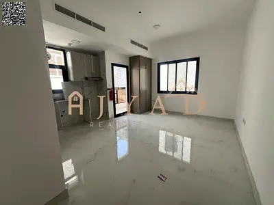 First-tenant studio for annual rent in Al Alia, Ajman. New building, prime location, easy Dubai exit, 1 month free, great price & payment plans.