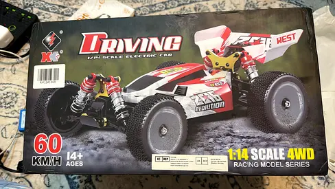 Wl rc super power car with brushless Moter brand new with box battry charger etc just open not use