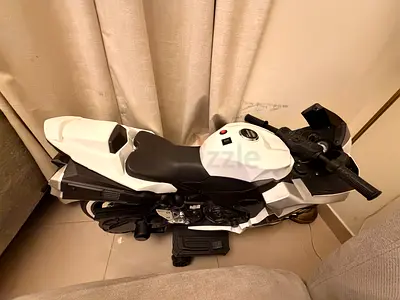 White Electric Ride-On Motorbike for Kids - Good Condition