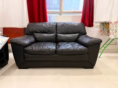 Black leather 2-seater sofa - used, good condition