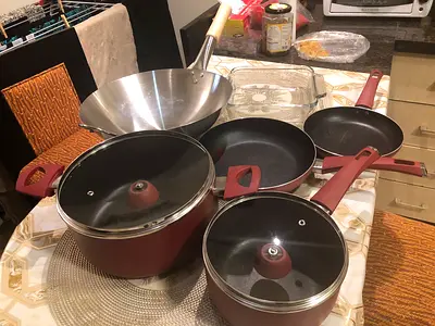 Used non-stick cookware set with lids (pots, pans and wok)
