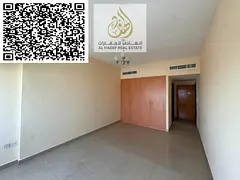 For annual rent in Ajman, Al Rashidiya 3, next to Grand Mall Ajman. Two bedrooms, living room, and