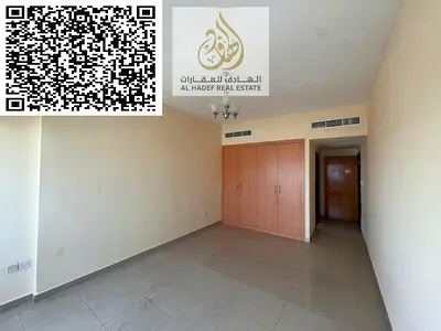 For annual rent in Ajman, Al Rashidiya 3, next to Grand Mall Ajman. Two bedrooms, living room, and