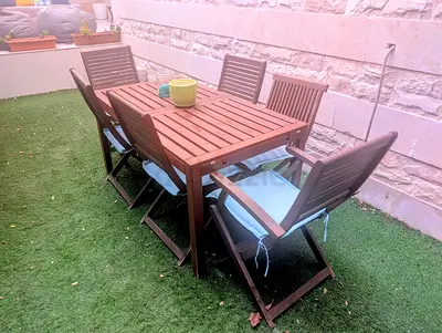 Wooden Outdoor Dining Table with 6 Folding Chairs - Good Condition (extendable)