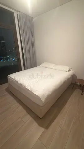 Bed base including new mattress